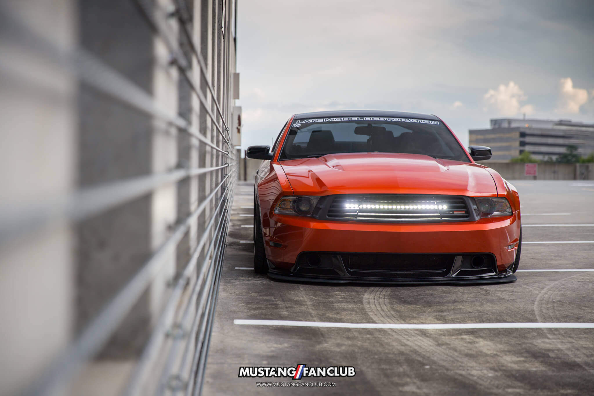 mustang fan club mustangfanclub @mustangfanclub 2011 11 mustang coyote 5.0L 5.0 wrapped bagged air suspension air lift performance rotiform wheels dillon shand RSE light bar saleen grille grill s197 3m 1080 fiery orange